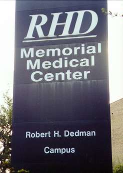 Dedman Hospital sign, LBJ Freeway, Dallas Tx. USA April 2001